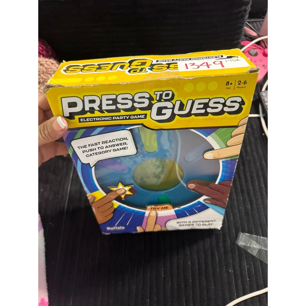 Press to Guess Electronic Party Game by‎ Buffalo Fast Reaction Category Game